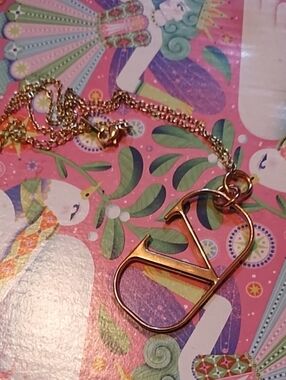 Gold Tone Valentino Beauty Pendant Necklace